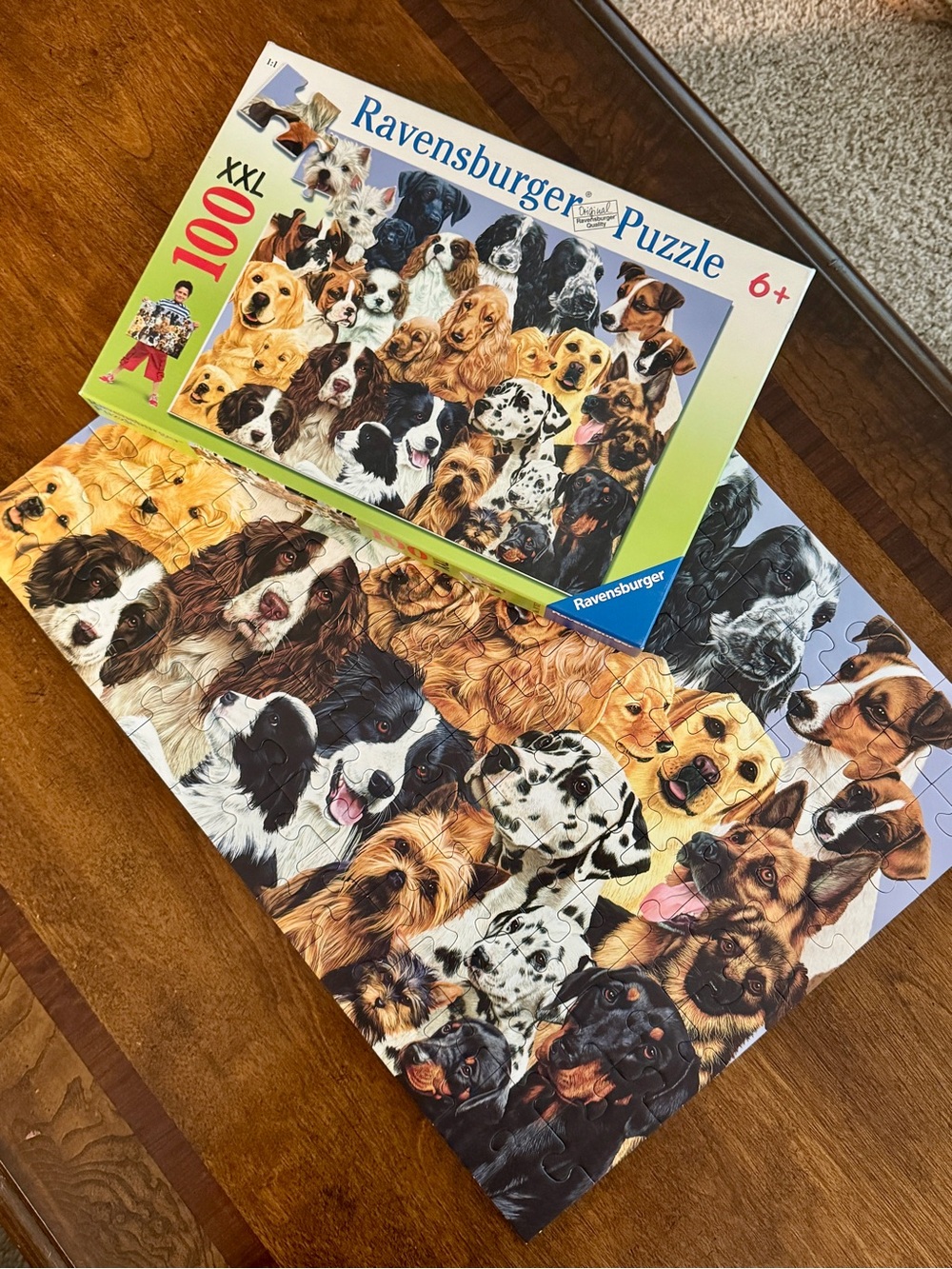 EUC Ravensburger 100-piece puzzle featuring various dog breeds - Fun!